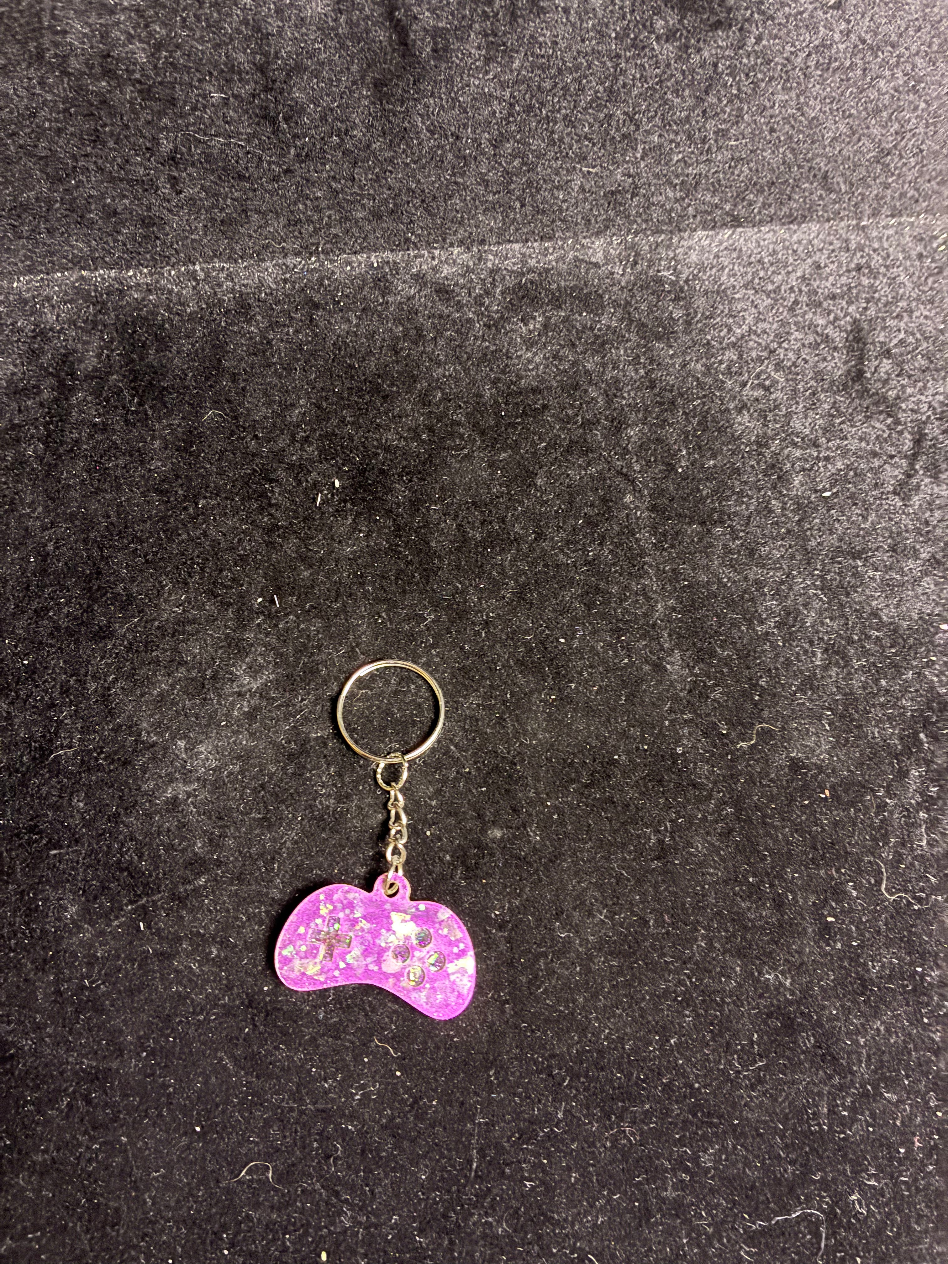Porte clé manette rose LES MERVEILLES DE SONIA