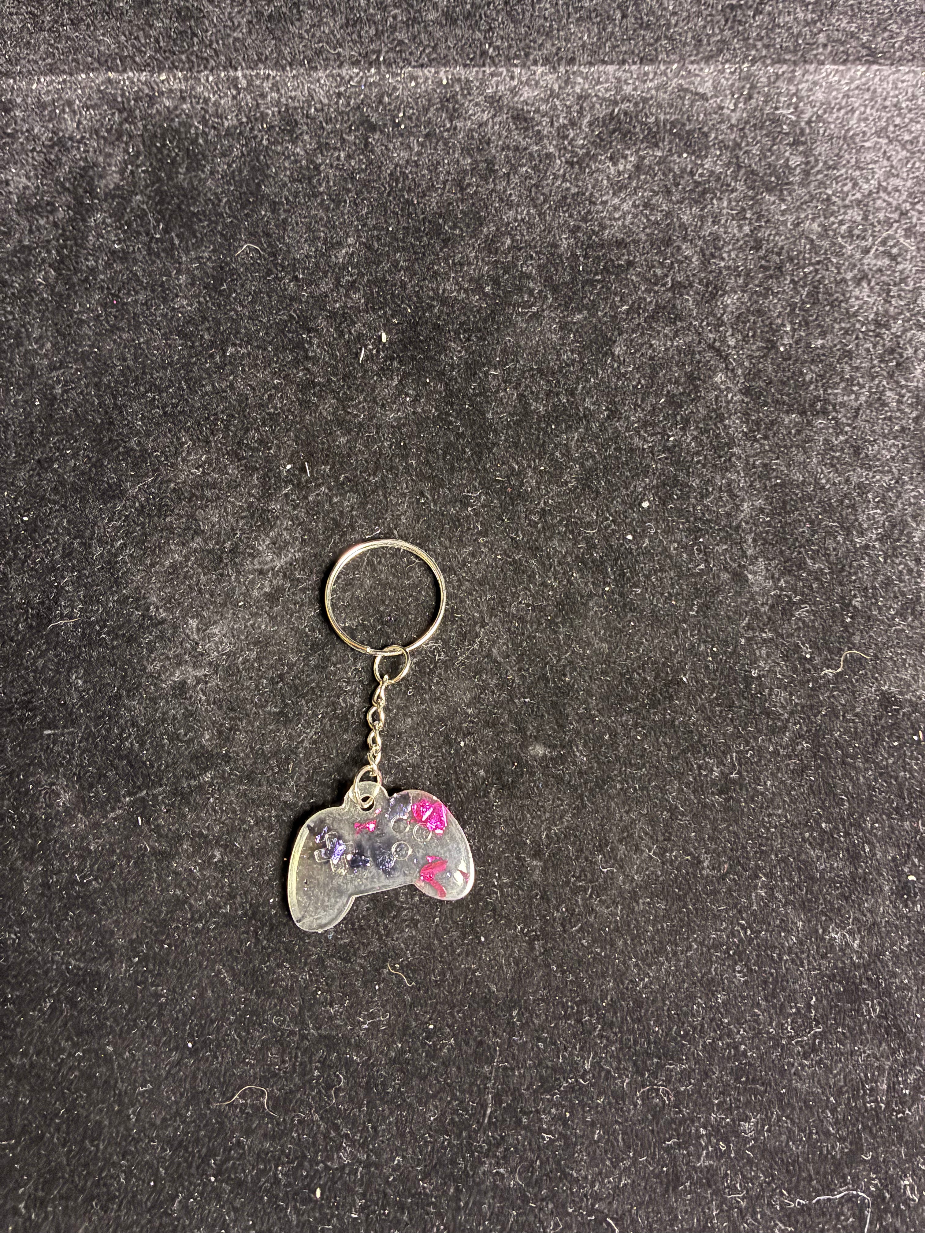 Porte clé manette rose et noire LES MERVEILLES DE SONIA