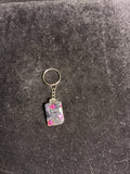 Porte clé manette rectangulaire rose et noire LES MERVEILLES DE SONIA