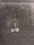 Porte clé manette rose et noire LES MERVEILLES DE SONIA