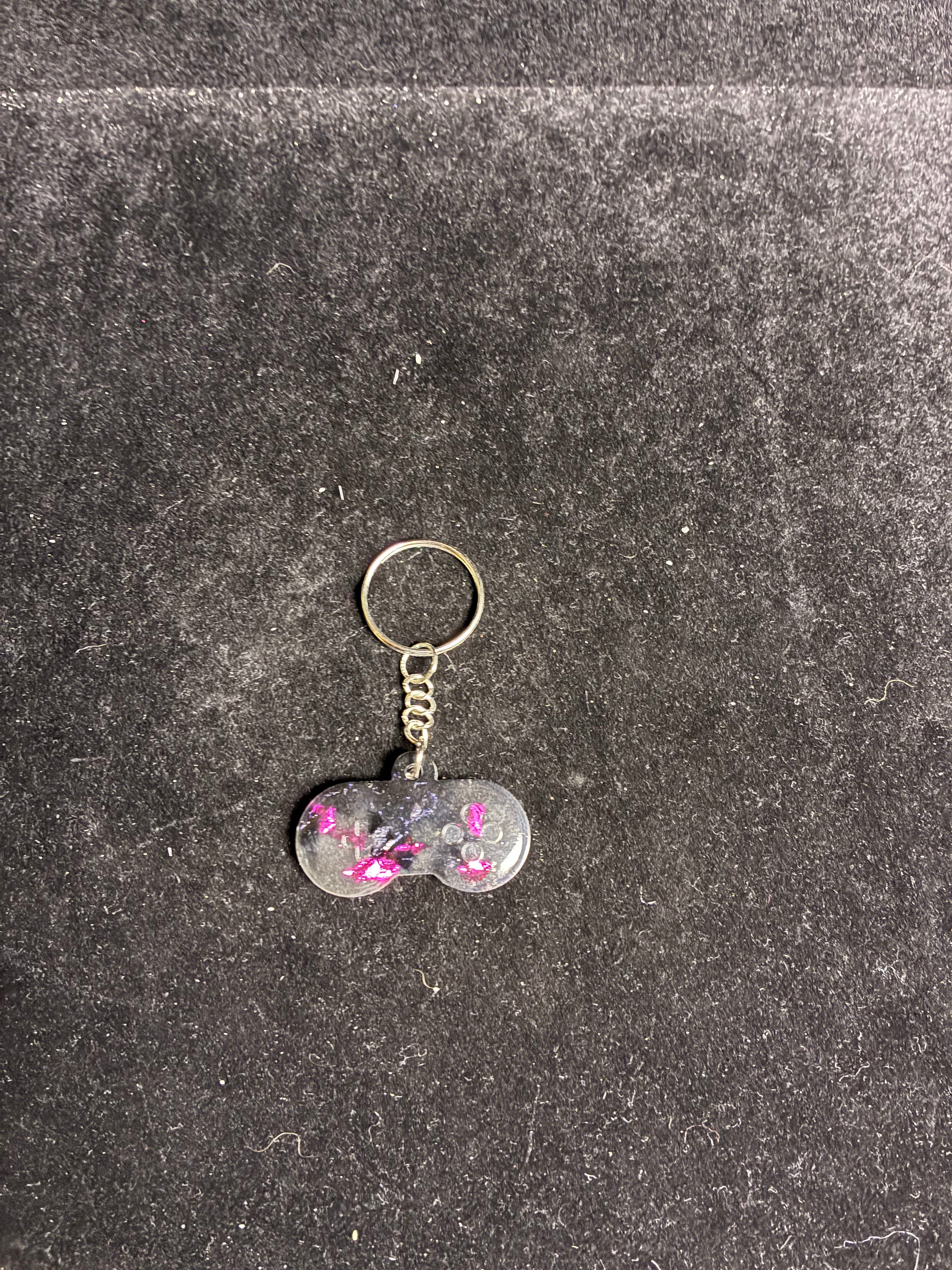 Porte clé manette rose et noire LES MERVEILLES DE SONIA