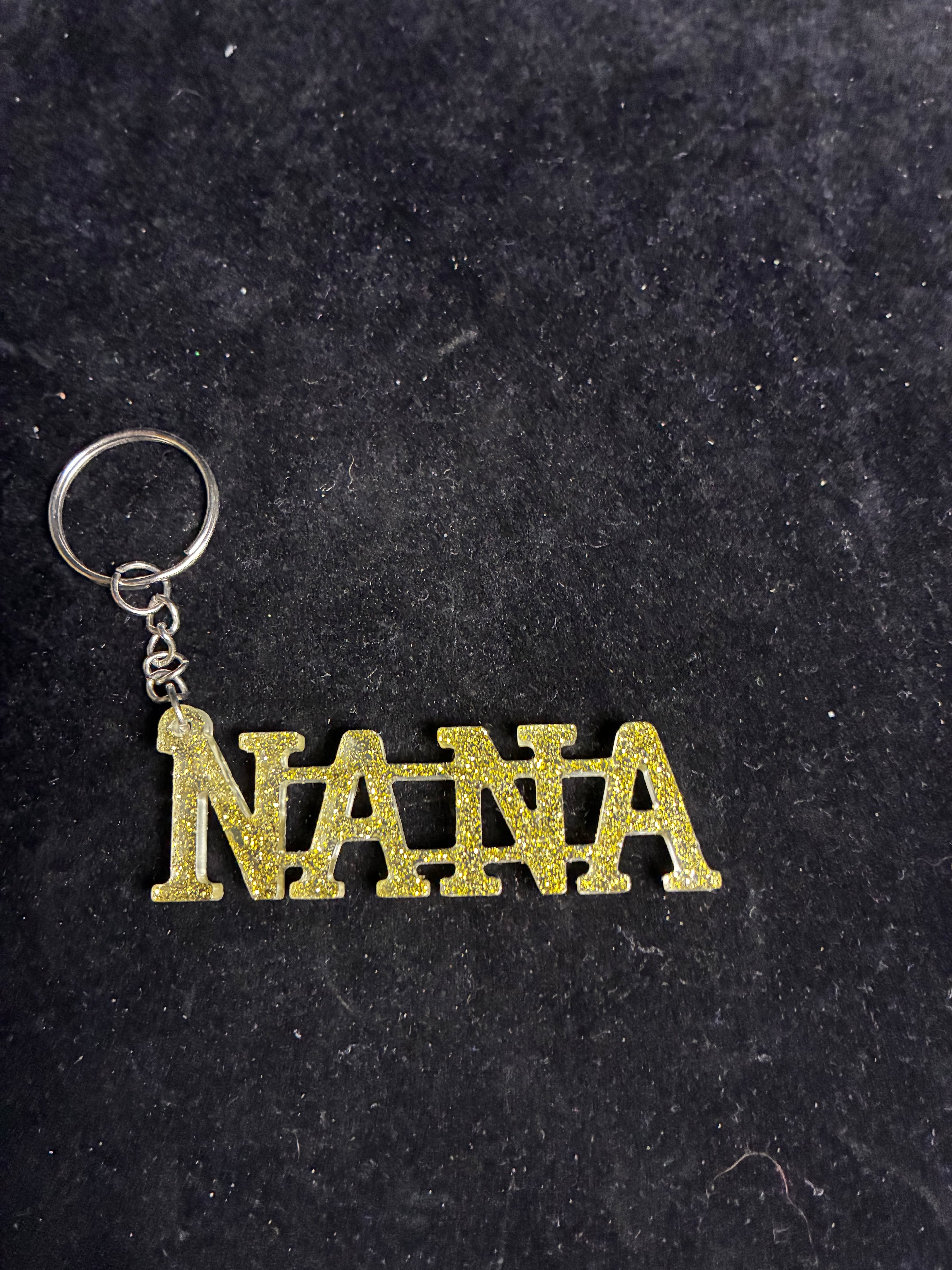Porte clé nana doré résine LES MERVEILLES DE SONIA