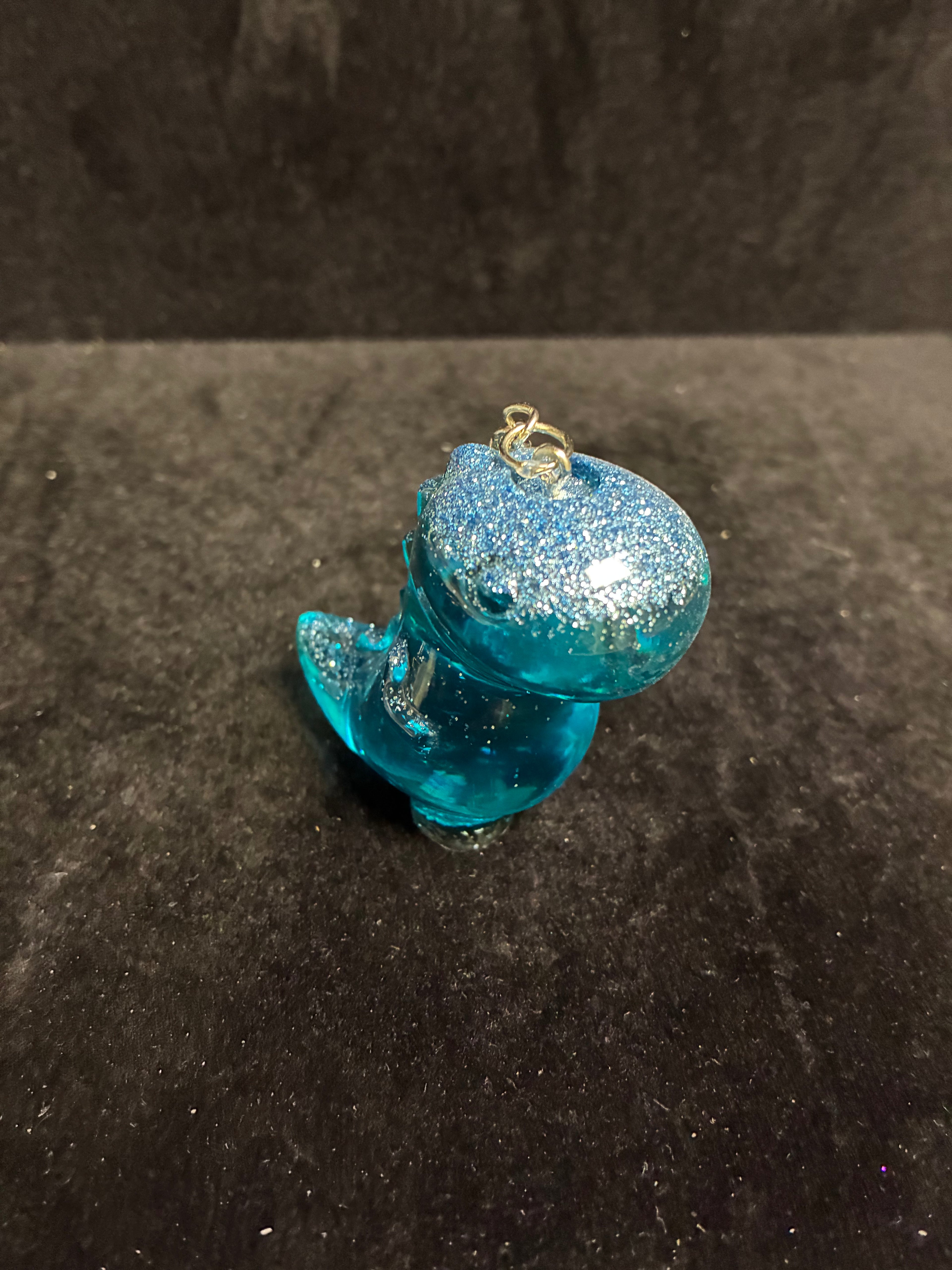 Porte clé dinosaure bleu LES MERVEILLES DE SONIA