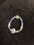Bracelet papillon bleu perle de verre ou résine LES MERVEILLES DE SONIA