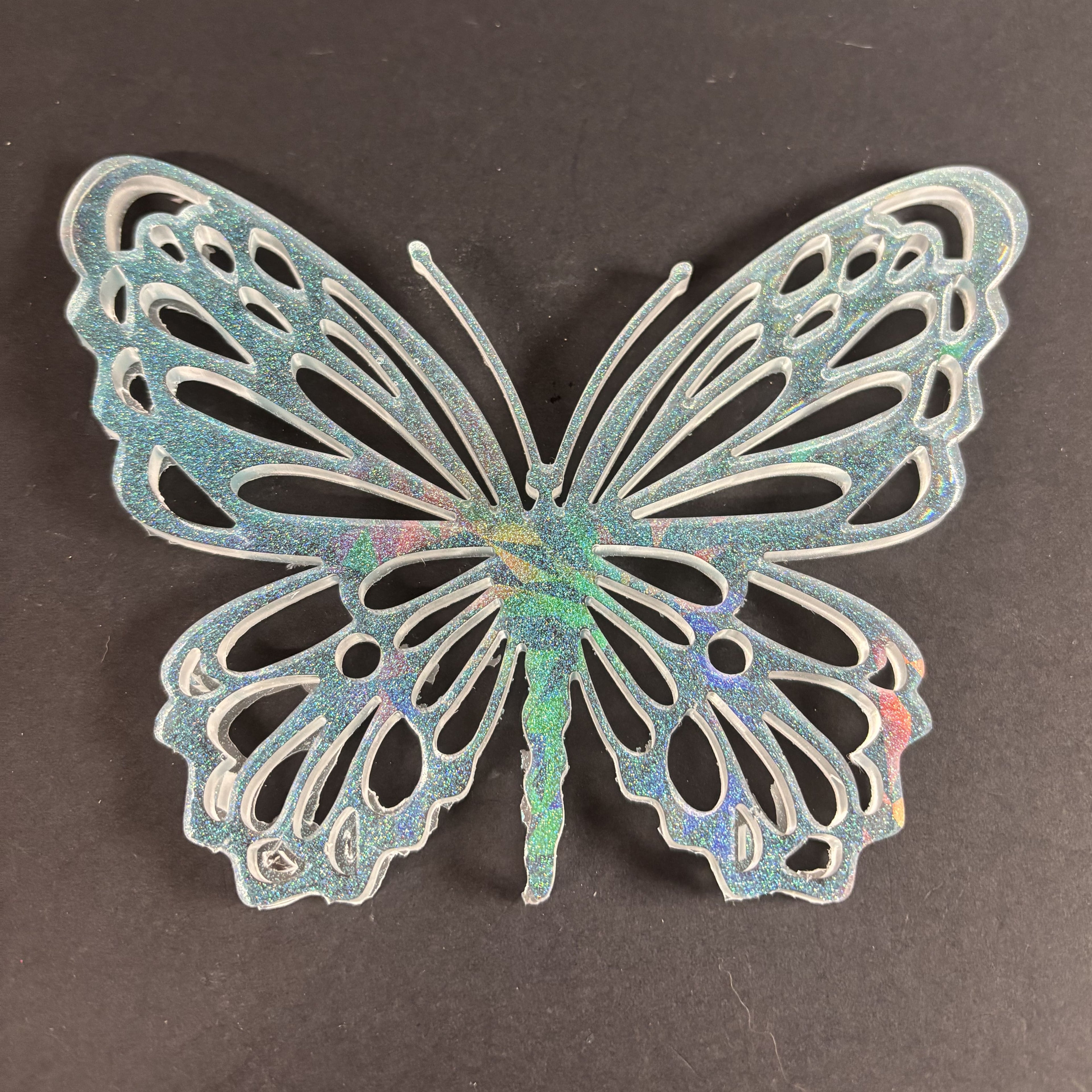 Papillon holographique bleu