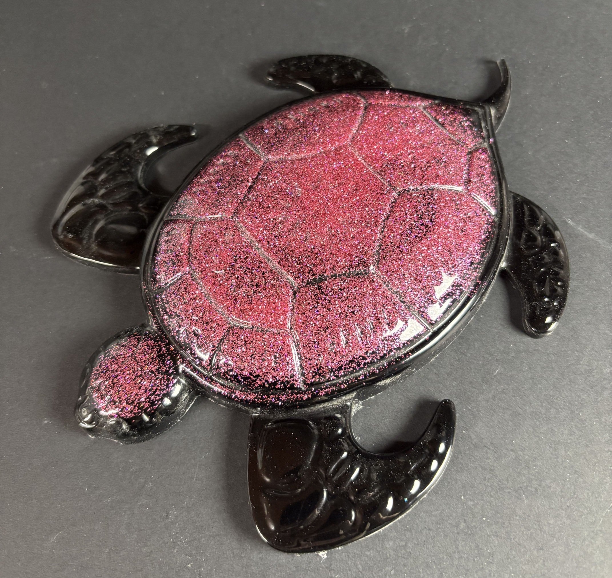 Tortue noire et rose